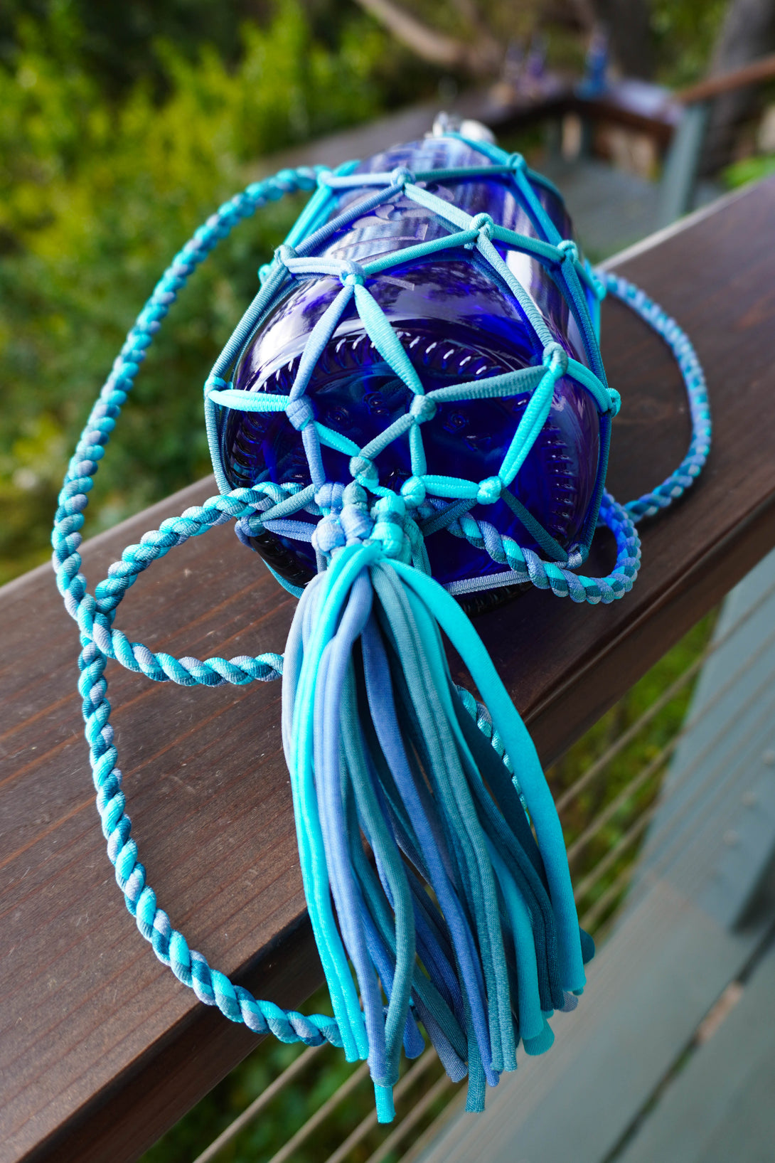 String Boottele String Bottle Holder ~ BackPack w/Tassel – Blue Bottle Love