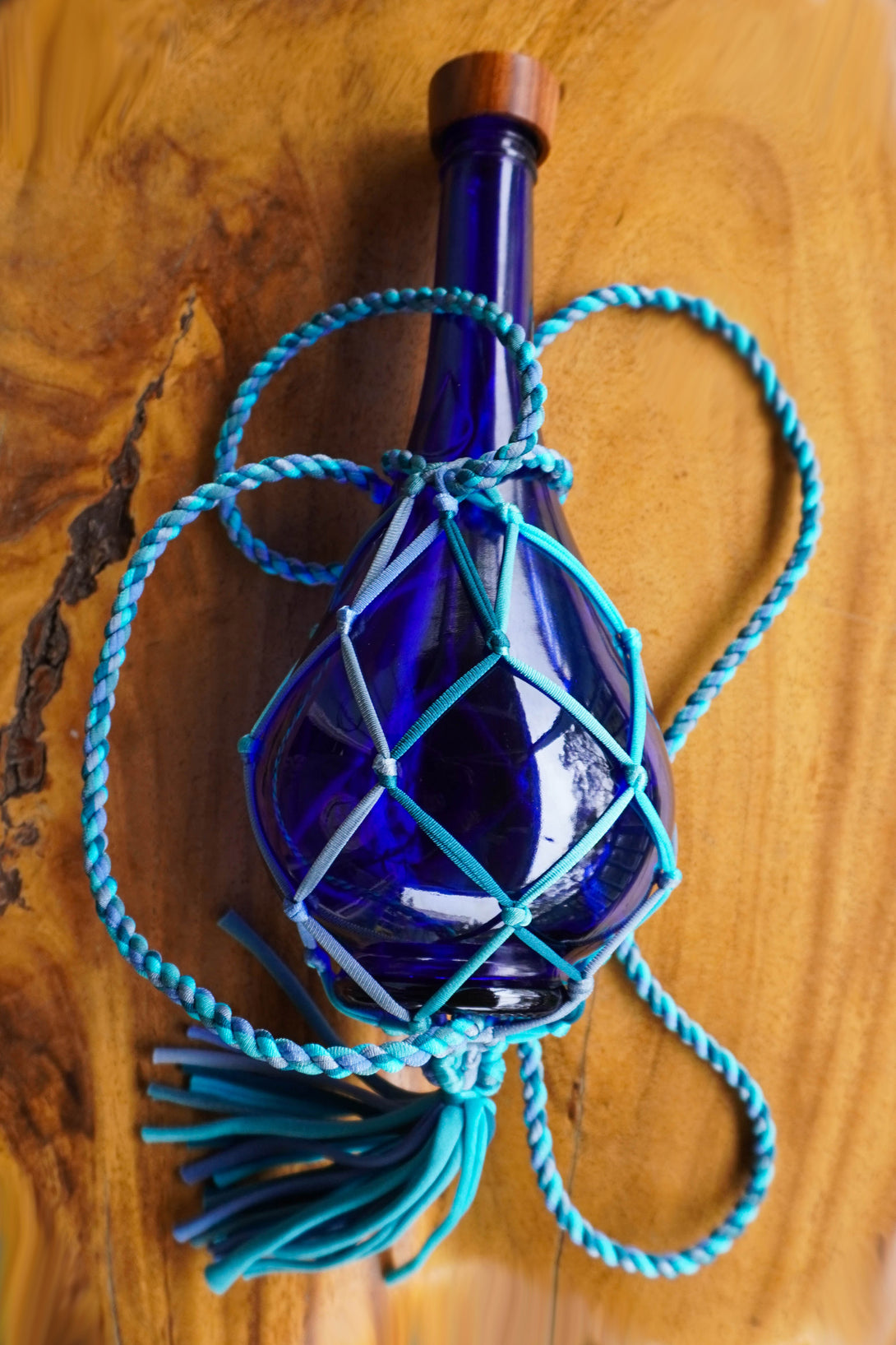 String Boottele String Bottle Holder ~ BackPack w/Tassel – Blue Bottle Love