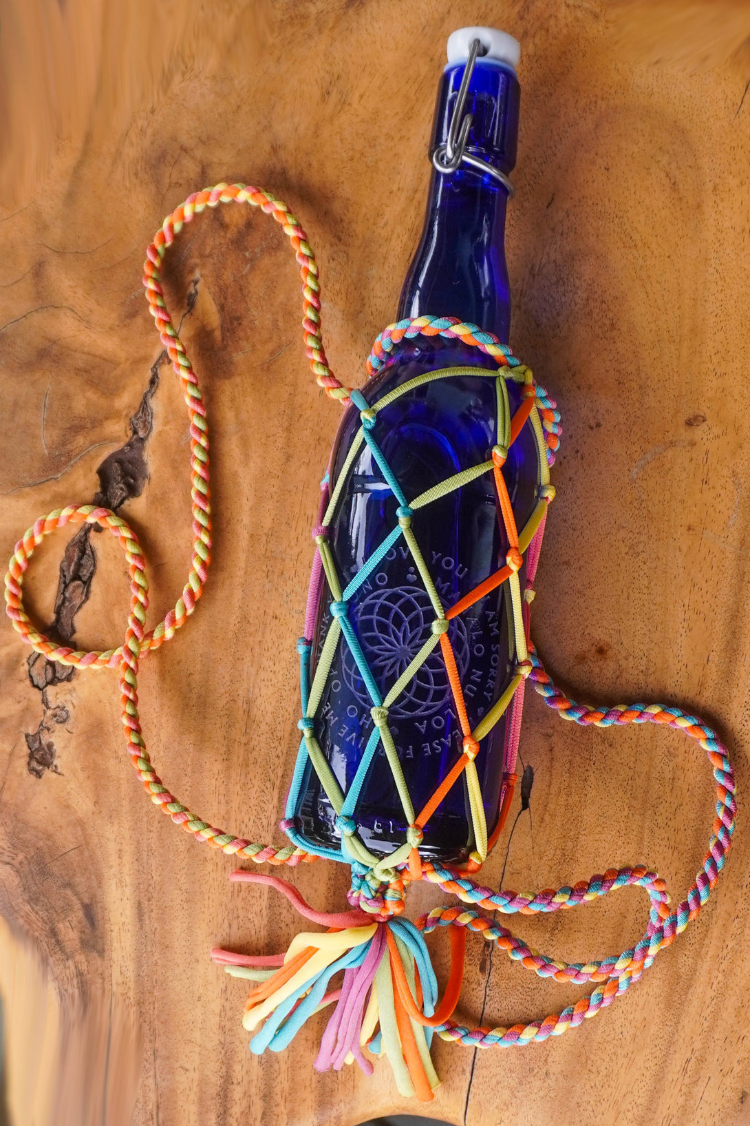 String Boottele String Bottle Holder ~ BackPack w/Tassel – Blue Bottle Love